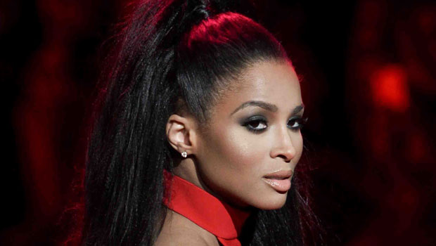 ciara-sunbathes-in-a-sexy-red-swimsuit-with-cut-outs-on-tropical-vacation-–-photo